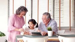 Senior man woman and little girl with relax emotion together at home. people with family, lifestyle, education concept. 4k resolution. Stock Footage