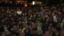 Bat-Signal projected onto Los Angeles City Hall News Clip