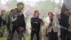 CLEAN : U2 band memebrs visit war-torn Bucha News Clip