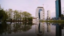 View of modern building of House of Justice near water in Batumi, Georgia Stock Footage
