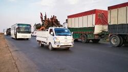 CLEAN : Syrian regime troops head towards the Syria Turkey border News Clip