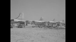 During Korean War after Inchon landing in South Korea, US soldiers getting off US military planes at captured Kimpo Air Base News Clip