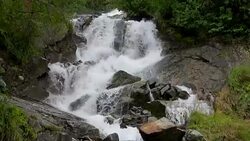 View waterfall scenes in mountains, national park Dombai, Caucasus, Russia Stock Footage