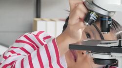 Education Topics:Funny little girl doing experiments in the laboratory.Science and education. Stock Footage