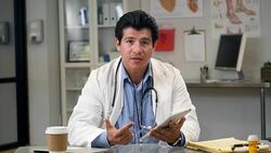 Hispanic male doctor video conferences with patient Stock Footage