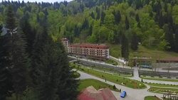 Aerial view of cozy hotel resort in forest of Caucasian mountains in Georgia Stock Footage