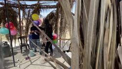 CLEAN : Islamic Jihad members launch incendiary balloons from Gaza towards Israel News Clip