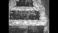 Street crowd; mechanical toys, model train; excited kids; 1930s News Clip