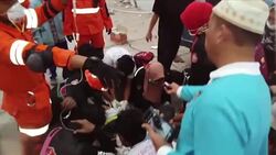 CLEAN : Indonesian rescue workers battle to find tsunami survivors News Clip