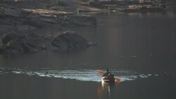 Man canoeing along Fitzroy river, Diamond Gorge, Mornington sanctuary. Editorial Use Only. Stock Footage