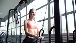 Woman lifting weight in the gym Stock Footage