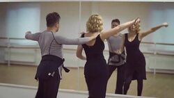 Man and a woman are dancing in the studio Stock Footage