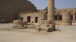 Karnak Temple in Luxor, Egypt. The Karnak Temple Complex, commonly known as Karnak, comprises a vast mix of decayed temples, chapels, pylons, and other buildings in Egypt. Stock Footage