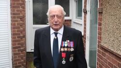 CLEAN : Britain's Royal Navy veteran pays tribute on doorstep on virus-afflicted Remembrance Sunday News Clip