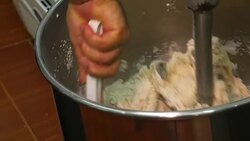 Mixing a dough for bread baking with professional machine at a restaurant. Stock Footage