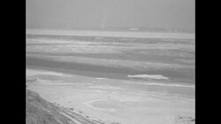 Bridge over Han River just south of Seoul, South Korea; frozen river views during the Korean War News Clip