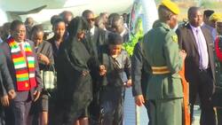 Grace Mugabe in black veil at airport ceremony Instructional Video